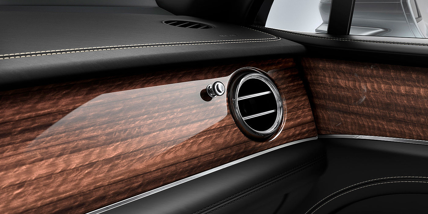 Bentley Hangzhou - Gongshu Bentley Bentayga front interior Crown Cut Walnut veneer and chrome air vent.