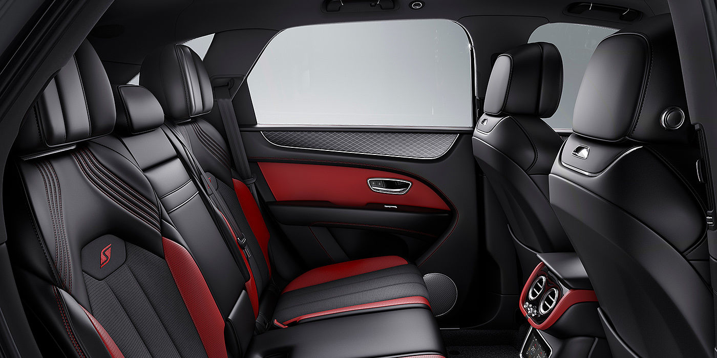 Bentley Hangzhou - Gongshu Bentey Bentayga S interior view for rear passengers with Beluga black and Hotspur red coloured hide.